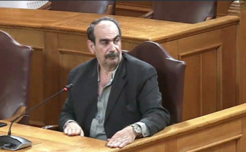 ΟΠΕΚΕΠΕ: Προκλητικός ο «φραπές» στην Εξεταστική – Το δικαίωμα της σιωπής, το Τζόκερ και η Πόρσε